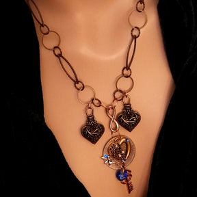 
Matching necklace set heart detail of sapphire blue world-renowned genuine Swarovski crystals and fairy charm, Victorian style vintage style

