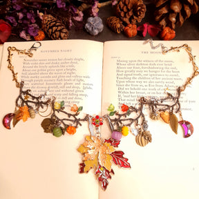 Halloween maple leaf and pumpkin necklace with colorful Swarovski crystals, layered nature details, and Volcano crystal moons shifting from red to purple to pink, Victorian style vintage style handmade jewelry
