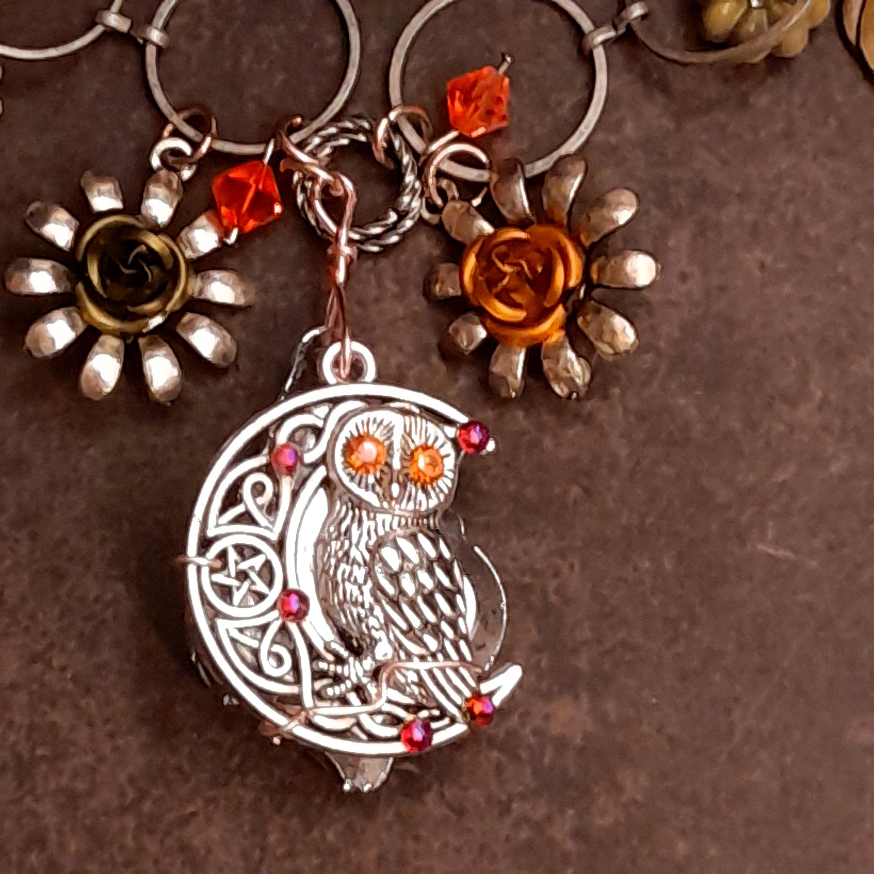 Reverse view of handmade Halloween necklace showing an owl perched on a crescent moon with Volcano Swarovski crystals behind the baroque pendant, Victorian style vintage style jewelry