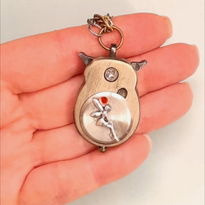 Cute owl pocket watch necklace back view fairy with orange Austrian crystal held in hand animal jewelry Victorian style vintage style handmade Rachel Flam Design