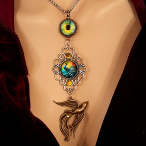 peacock cabochon peacock eye magical phoenix swarovski volcano and peridot crystals hidden fairies on the back