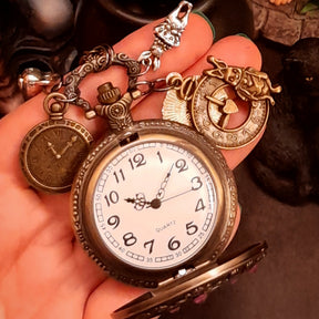 Magical fantasy handmade Alice in Wonderland pocket watch necklace open showing interior detail victorian style