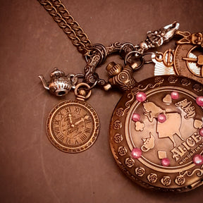 magical handmade fantasy Alice in Wonderland pocket watch necklace with world-renowned genuine Swarovski purple crystals white rabbit clocks and teapot