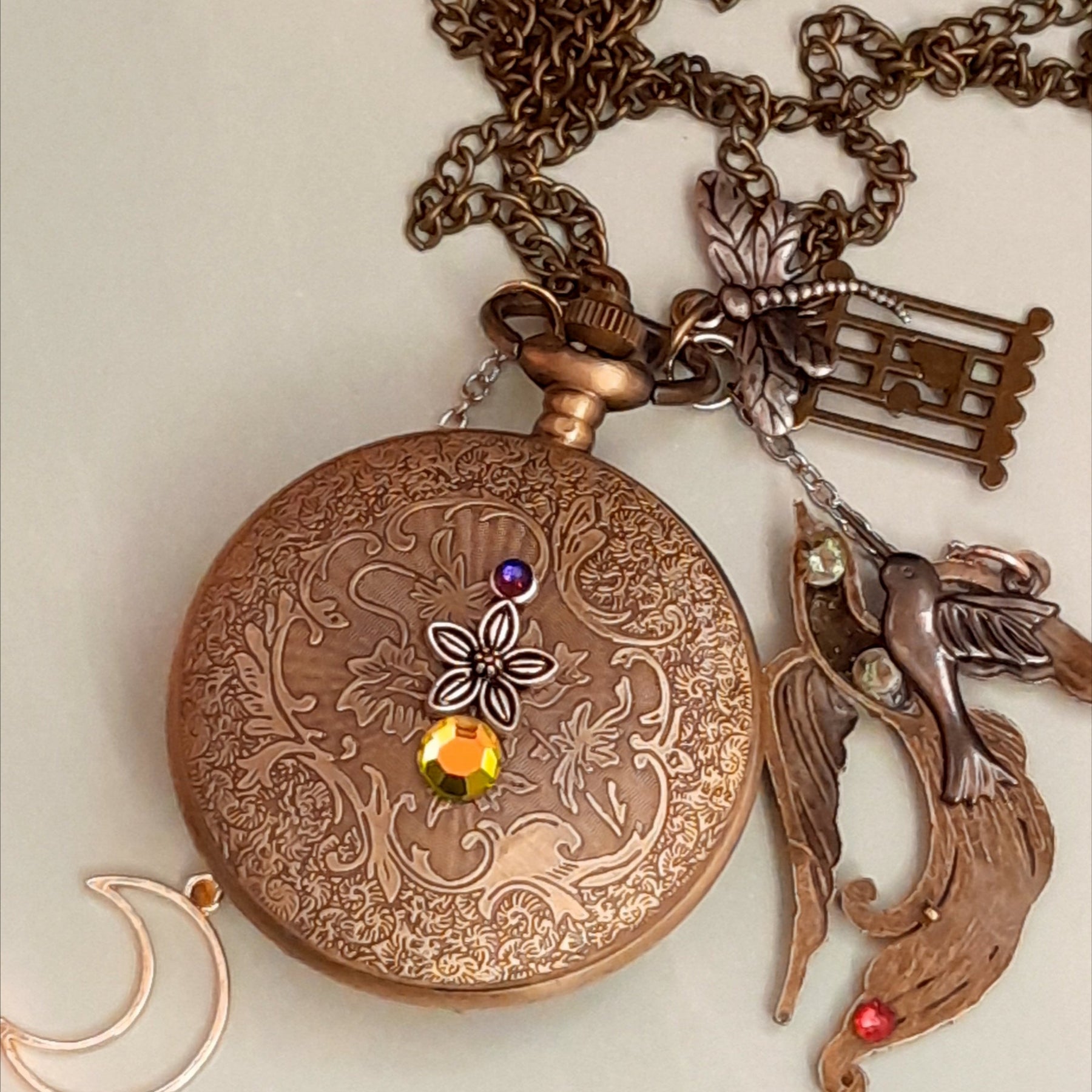 One of a kind fantasy pocket watch necklace back detail with phoenix, moon and engraved flourishes, Swarovski crystals, Victorian style, vintage style, Rachel Flam Design