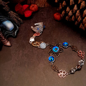 blue hand chain with faries druzy crystal dragon eye and leaves and flowers