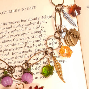 Purple crystal pumpkins and woodland charms on a one of a kind Halloween fantasy necklace in Victorian style and vintage style by Rachel Flam Design