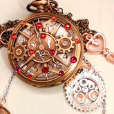 Steampunk pocket watch necklace closed front with skeleton key charm and red Swarovski crystal steampunk gears disc antiqued brass Victorian style vintage style fantasy handmade