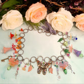 Handmade magical fantasy butterfly boho necklace with rainbow Swarovski crystals and nature charms, Victorian style vintage style antique silver chain

