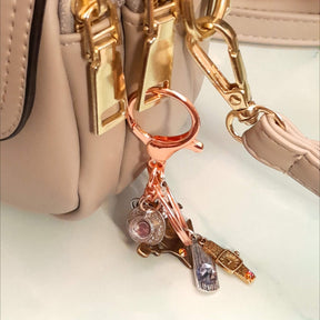 Teacup Queen of Hearts Drink Me tag White Rabbit Swarovski crystal handmade fantasy purse charm zipper pull keychain Rachel Flam Design Victorian style vintage style