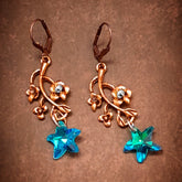Turquoise floral earrings with color-shifting Swarovski crystal stars, botanical details, Victorian style and vintage style fantasy jewelry by Rachel Flam Design