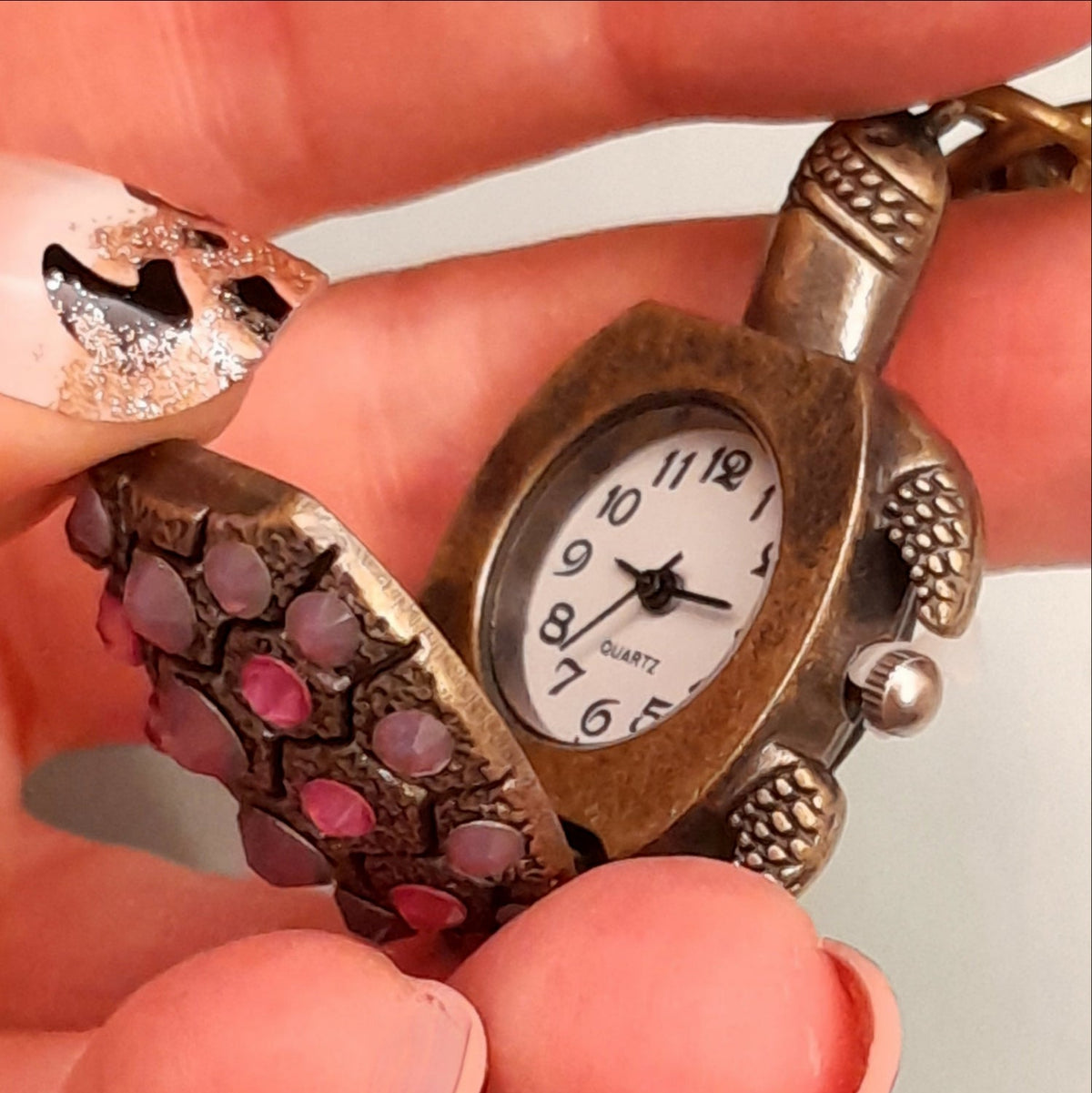 Turtle purse charm opened to reveal working quartz watch face inside, purple Swarovski crystals on shell, Victorian style vintage style handmade Rachel Flam Design