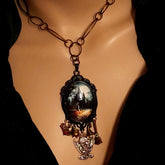 Victorian style vintage style witchy castle and dragon necklace with magical charms, ornate pendant, and Swarovski crystals, Rachel Flam Design