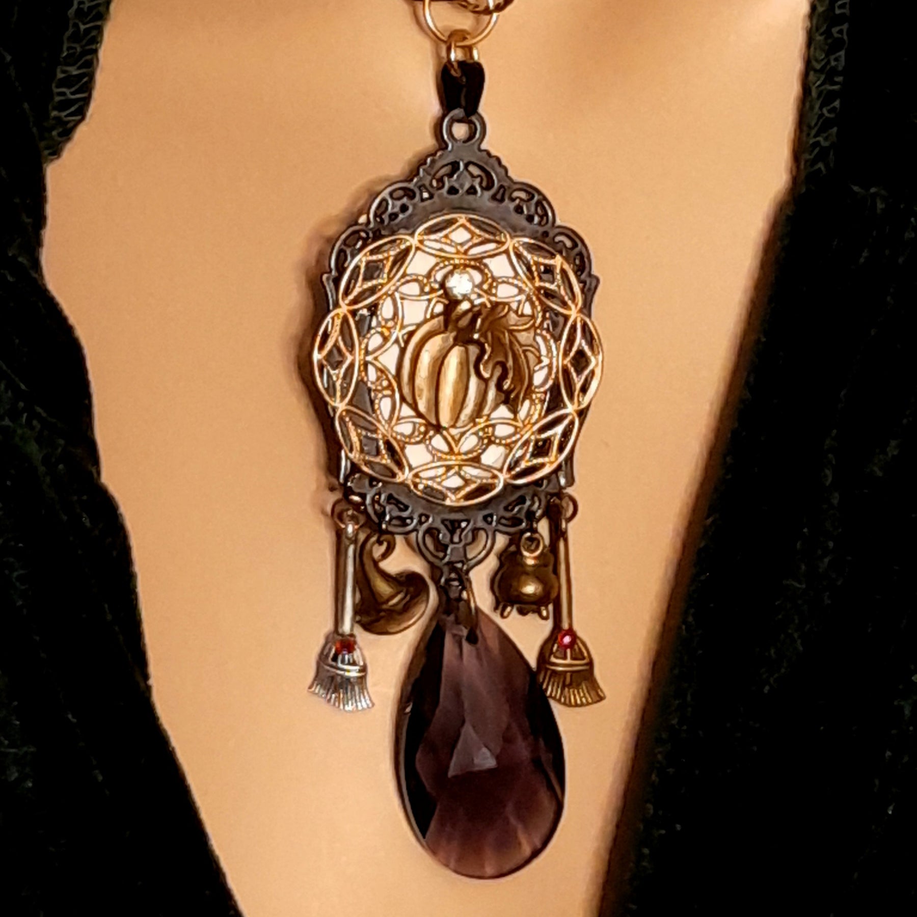 Double-sided handmade witchy necklace with an ornate pumpkin reverse, witch and raven pendant, purple Swarovski crystals, Victorian style and vintage style magical fantasy jewelry by Rachel Flam Design