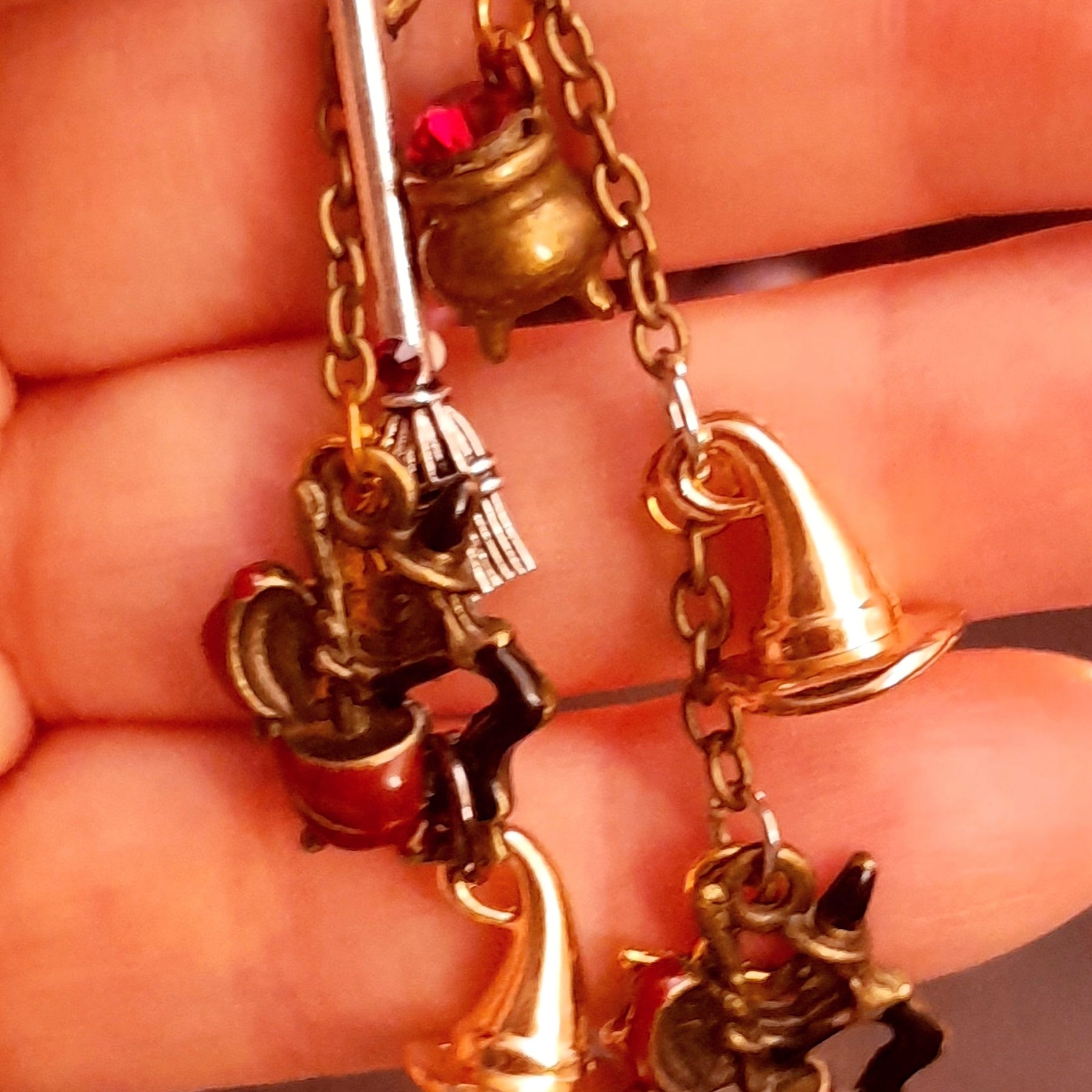 Detailed witchy dangle earrings with crystals tucked into the cauldrons and beneath the witch hats, Victorian style and vintage style magical fantasy jewelry by Rachel Flam Design