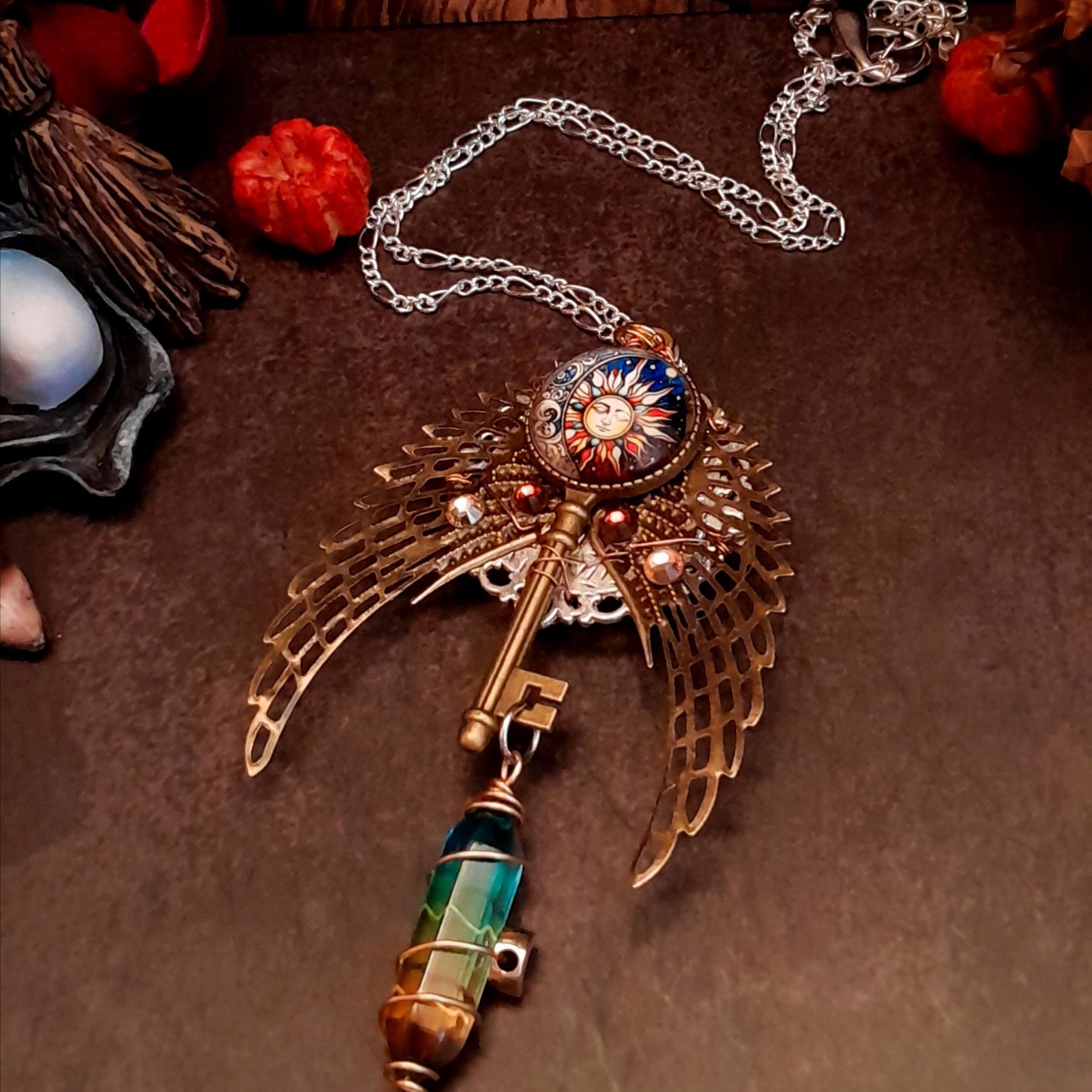 boho hippie sun and moon cabochon necklace glass icicle in pink yellow and green. angel wings swarovski crystals