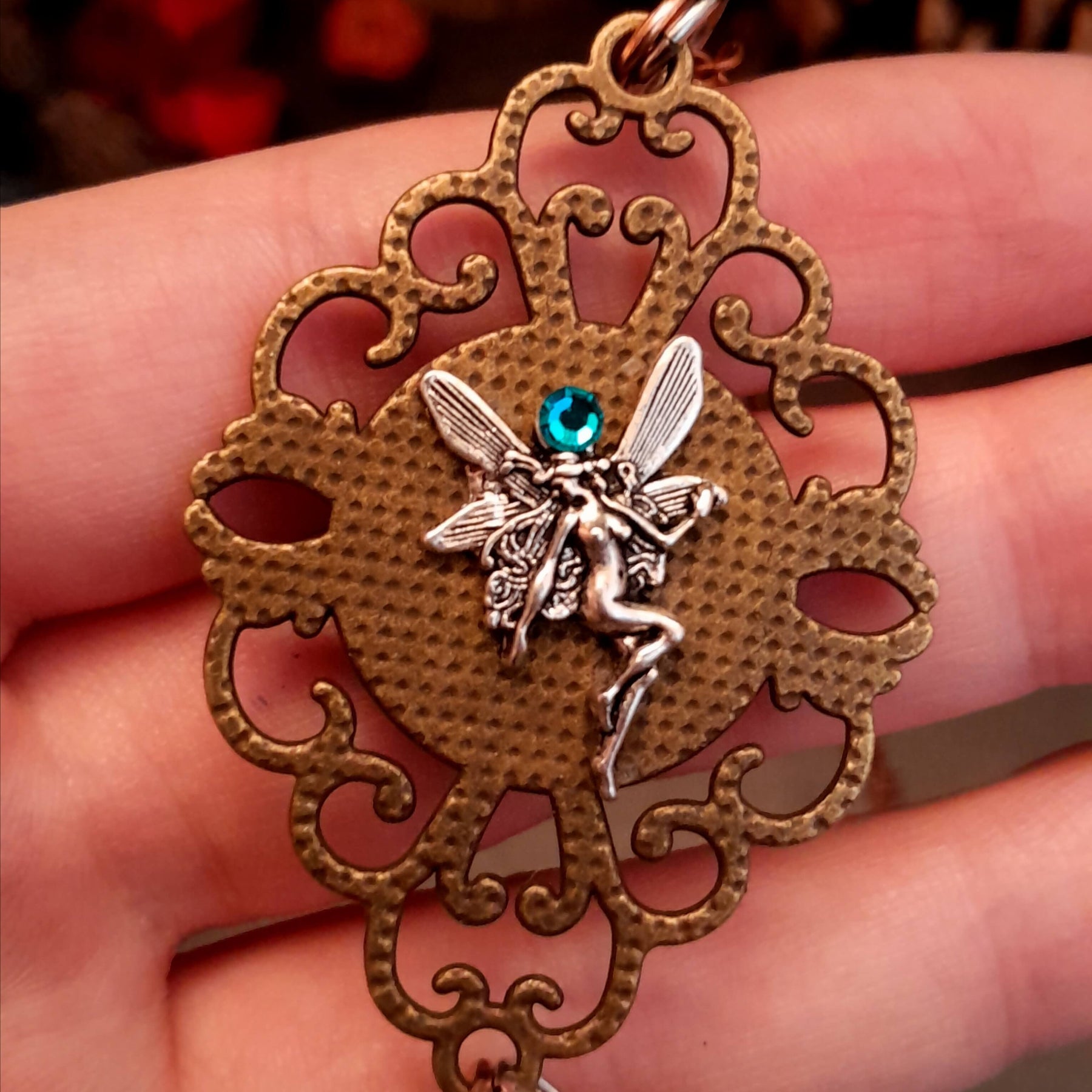 Victorian style bird necklace with tree of life cabochon, bird cage and bird, turquoise swarovski crystals silver filigree moon gold star and copper leaf. 