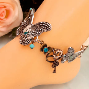 Handmade magical fantasy turquoise butterfly anklet with steampunk floral details and genuine Austrian crystals, Victorian style vintage style, secret garden fairy jewelry