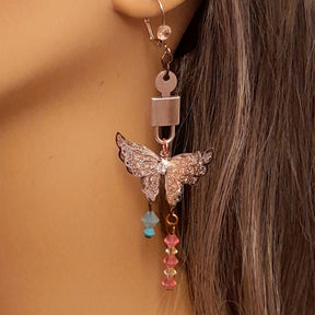 Silver tone handmade fantasy butterfly and key earrings non-matching Victorian style vintage style swarovski crystal