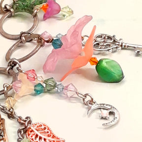 Handmade magical fantasy rainbow flower necklace with multicolor Swarovski crystals and nature charms, Victorian style vintage style