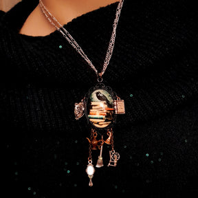 fairytale necklace with book mirror spinning wheel crest magic lamp witch hat broom and crow on books