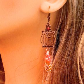 bird cage earrings with bird and multi color dangling crystal