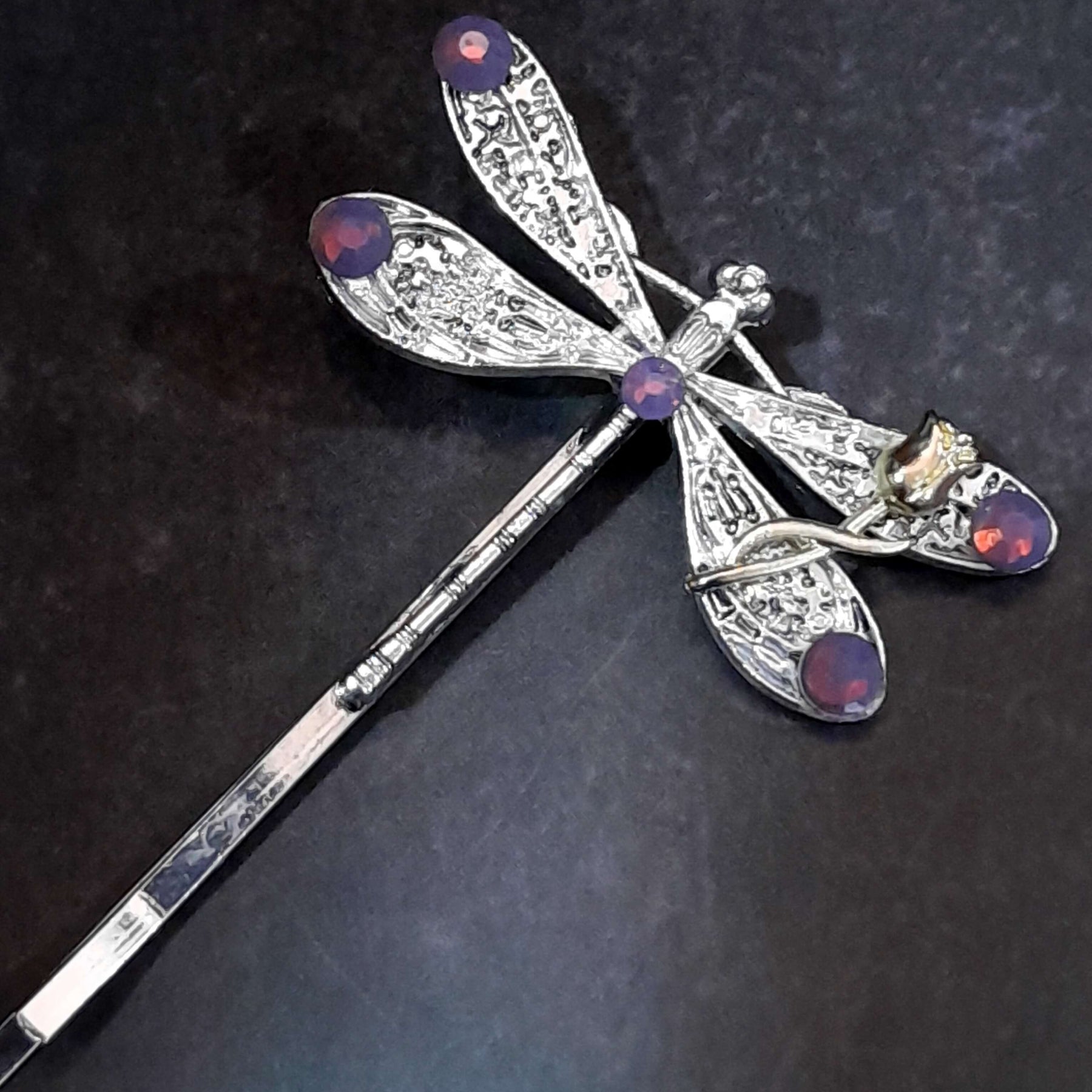 dragonfly hairclip with swarovski amethyst opal purple crystals and a small flower accent