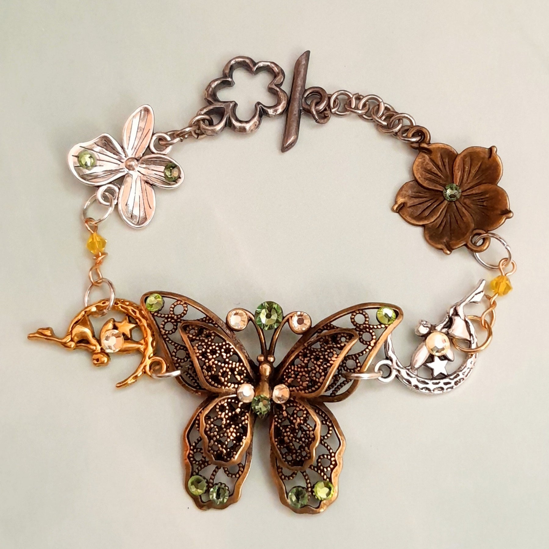 Butterfly bracelet with green Swarovski crystals, Victorian style vintage style handmade fantasy jewelry

