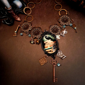 crow necklace fairytale  motifs witch hat room cauldron spinning wheel key