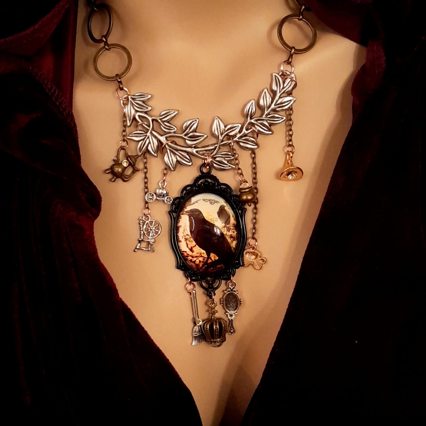 fairytale crow necklace witch hat spinning wheel cauldron mirror broom pumpkin carraige magic lamp