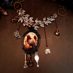 fairytale crow necklace witch hat spinning wheel cauldron mirror broom pumpkin carraige magic lamp