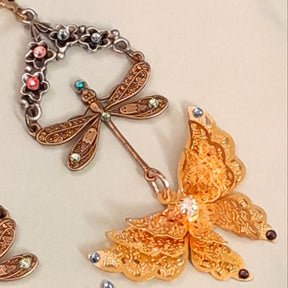 One of a kind Victorian style vintage style gold tone butterfly and dragonfly dangle earrings handmade in Long Island NY