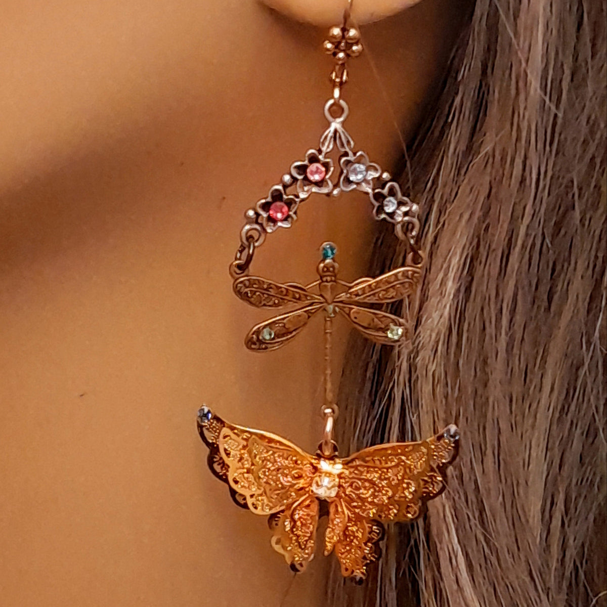 Magical fantasy Victorian style vintage style gold tone butterfly earrings with flowers and dragonfly charm