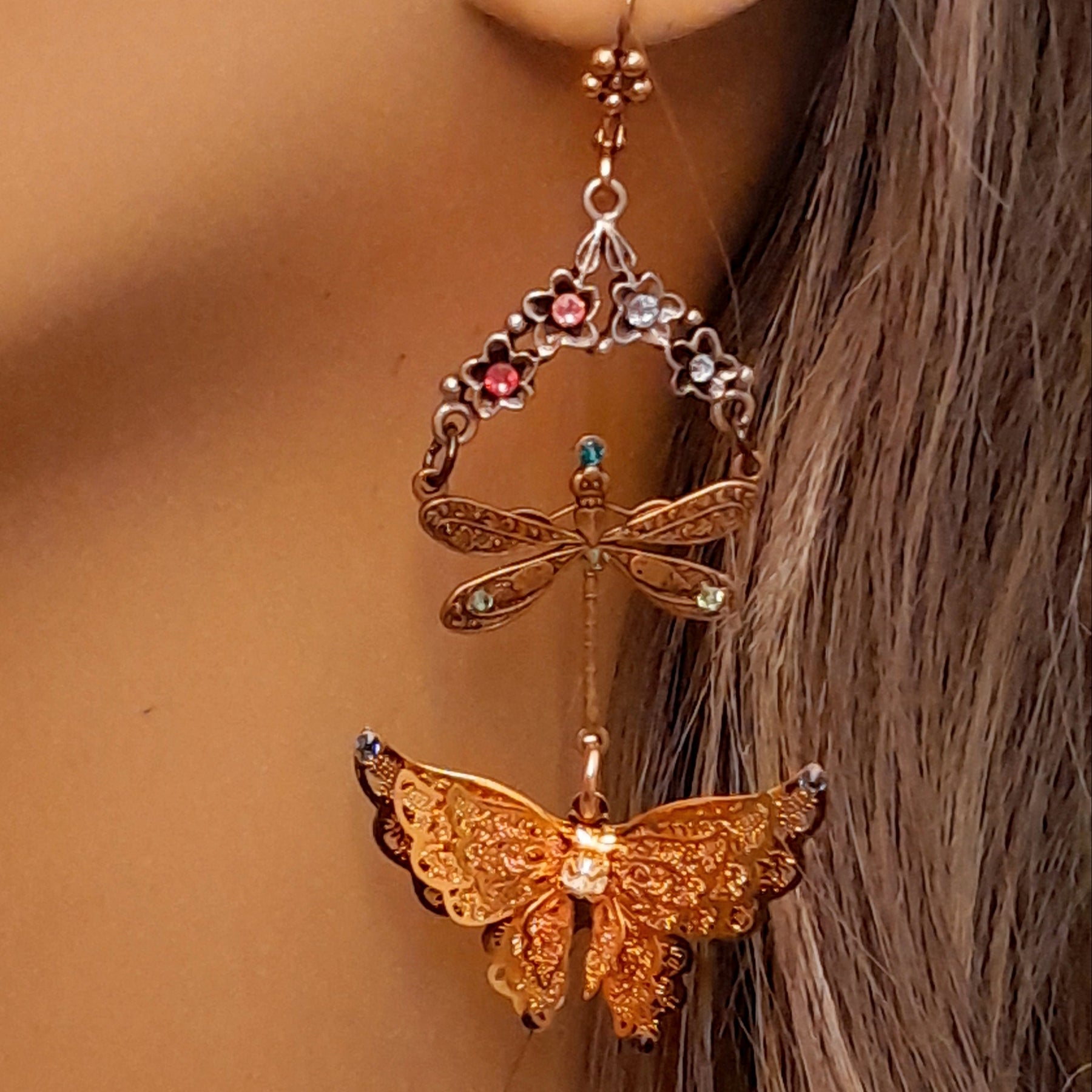 Magical fantasy Victorian style vintage style gold tone butterfly earrings with flowers and dragonfly charm