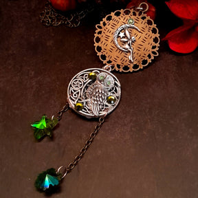 Moon sun cabochon necklace with a double sided owl and green swarovski crystals