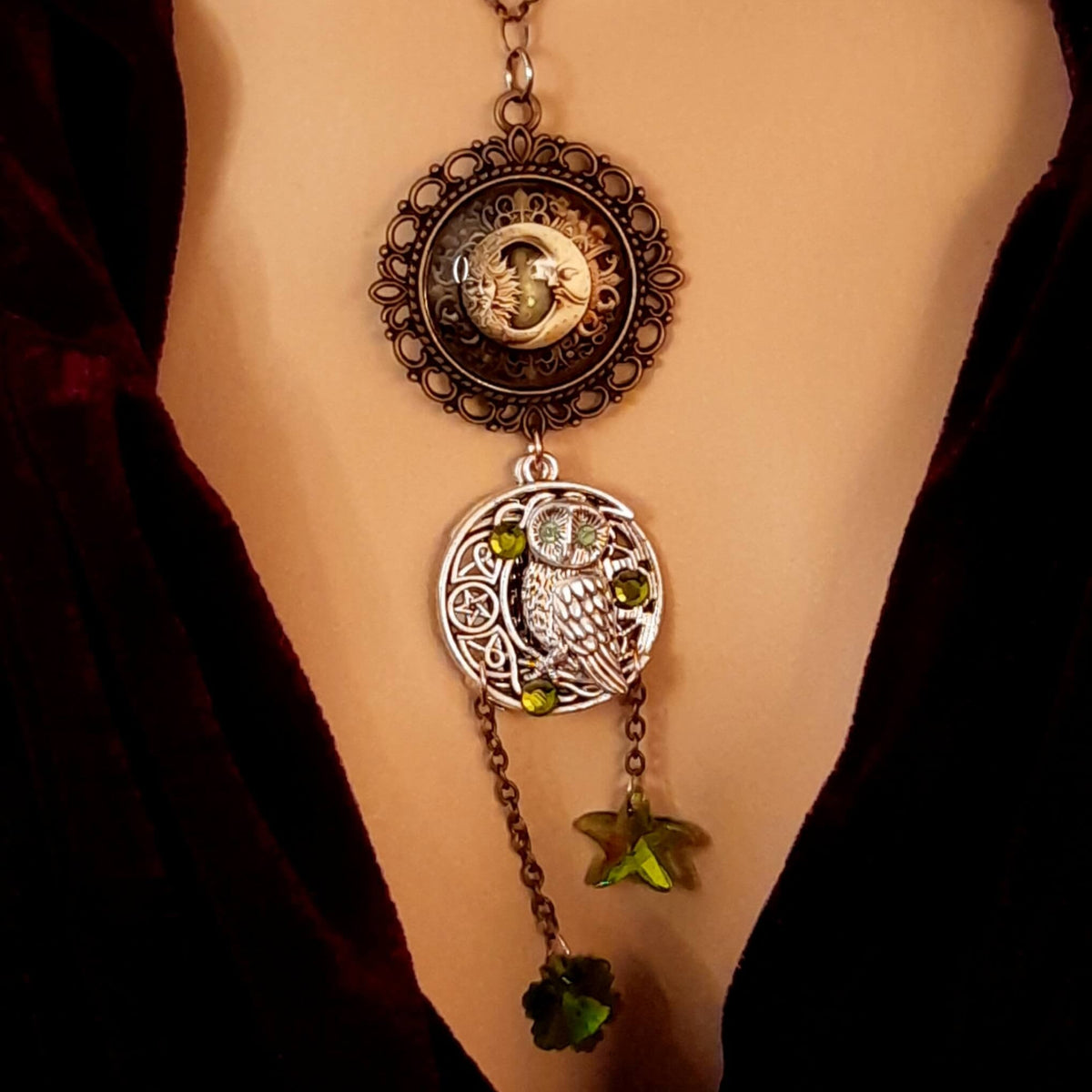Moon sun cabochon necklace with a double sided owl and green swarovski crystals