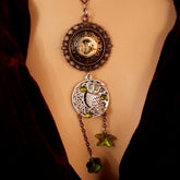 Moon sun cabochon necklace with a double sided owl and green swarovski crystals