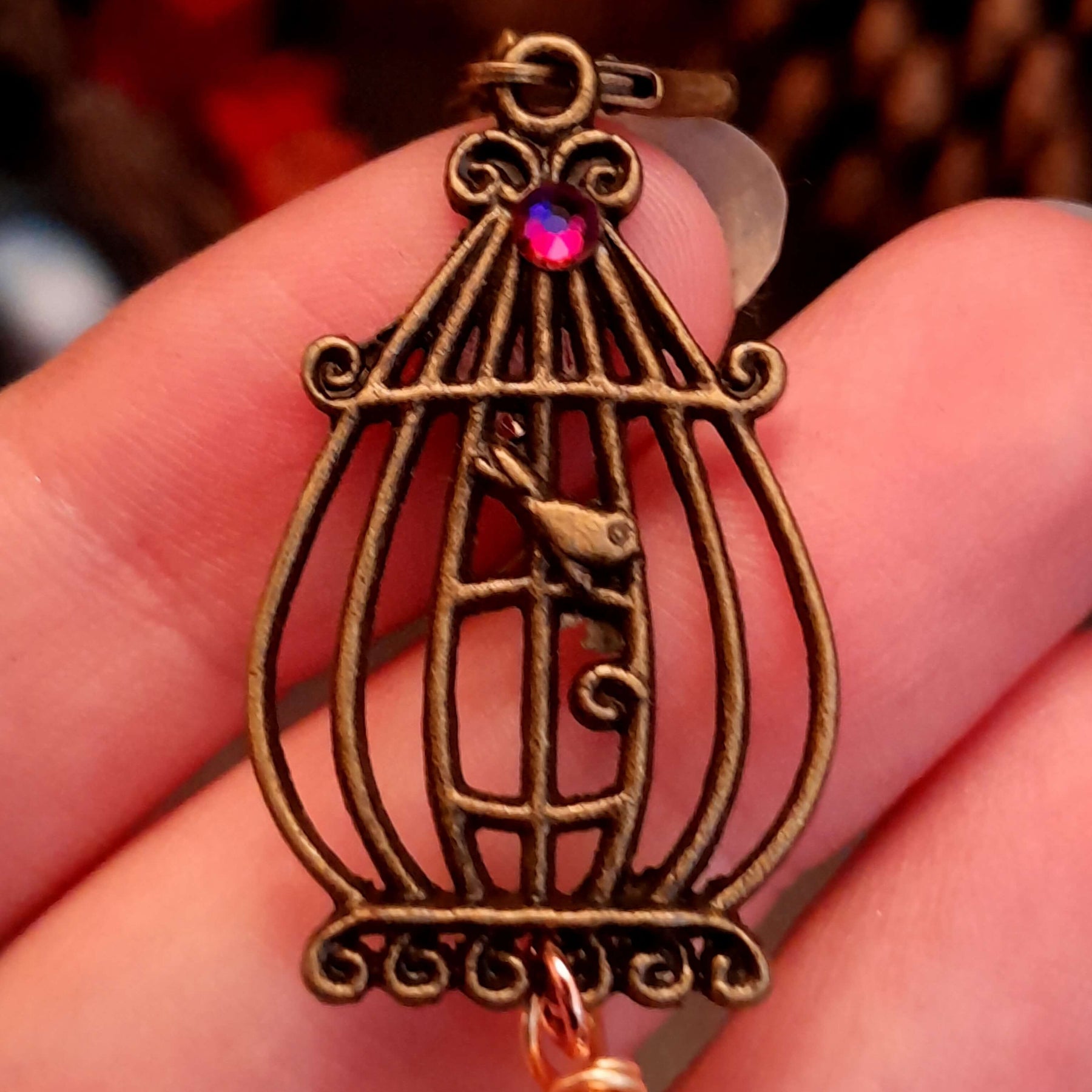 bird cage earrings with bird and multi color dangling crystal