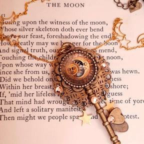 bohemian sun and moon cabochon necklace with stars and gold chain with stars and moons