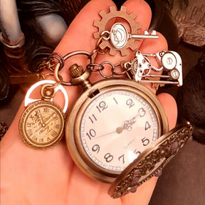 Handmade vintage style pocket watch necklace featuring Swarovski crystals and intricate clockwork gears