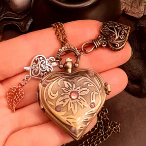 Handmade fantasy heart pocket watch necklace charm details with lavender purple Swarovski crystals, Victorian vintage steampunk style jewelry