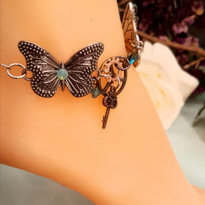 Handmade magical fantasy large butterfly anklet with steampunk key and gear details, Victorian style vintage style, turquoise crystal fairy jewelry