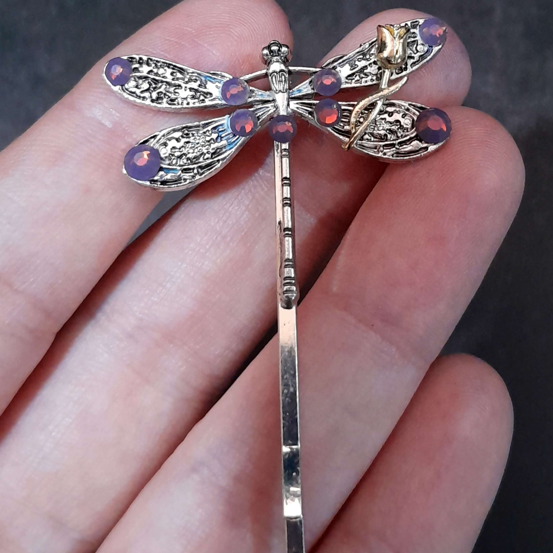dragonfly hairclip with swarovski amethyst opal purple crystals and a small flower accent