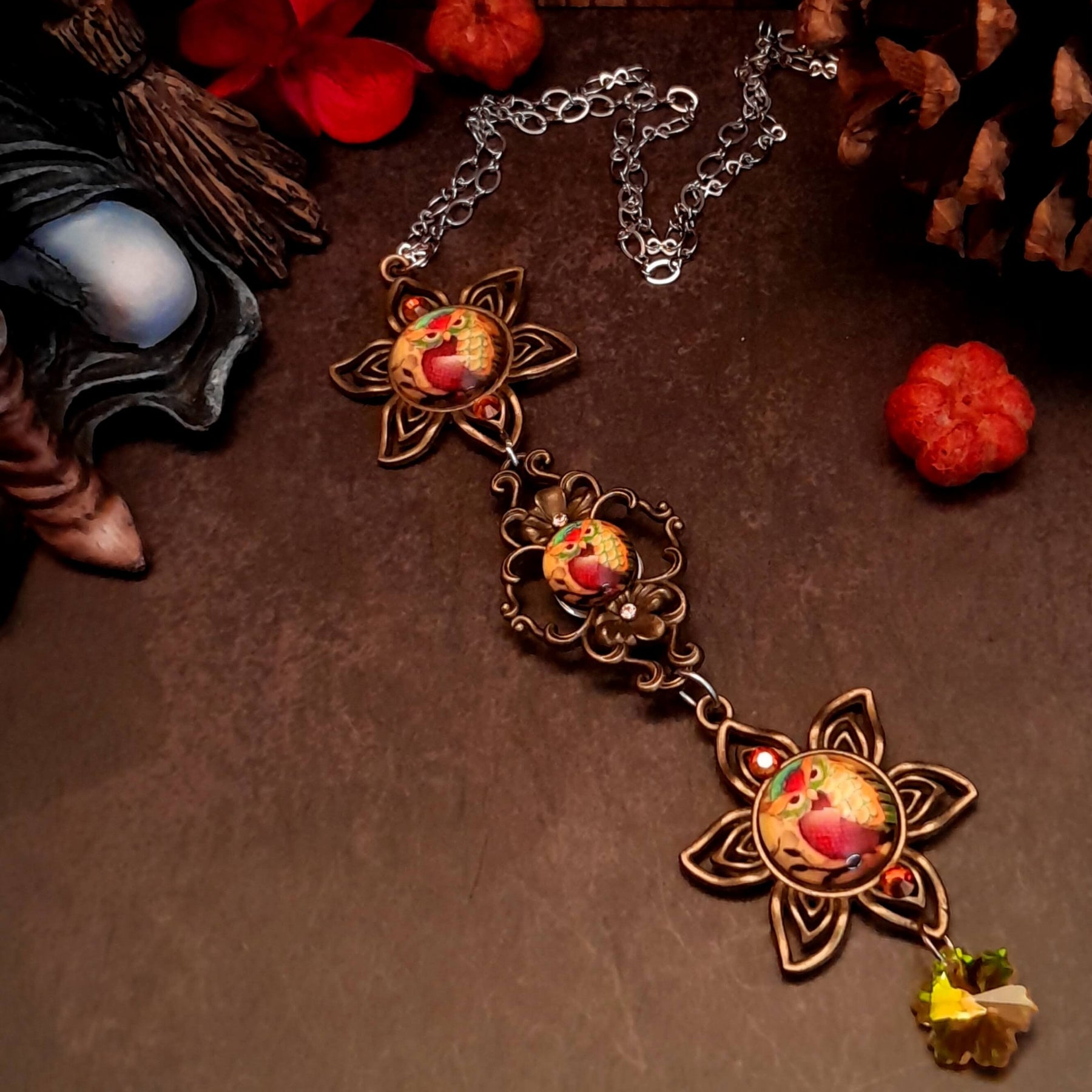necklace with 3 owl cabochons with yellow backgrounds and Yellow Swarovski crystals