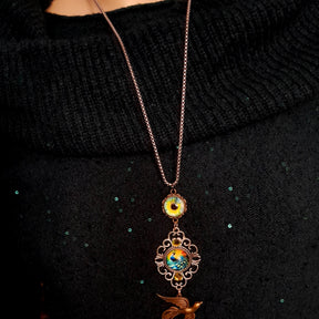 peacock cabochon peacock eye magical phoenix swarovski volcano and peridot crystals hidden fairies on the back