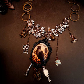 fairytale crow necklace witch hat spinning wheel cauldron mirror broom pumpkin carraige magic lamp