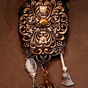 fairytale crow necklace witch hat spinning wheel cauldron mirror broom pumpkin carraige magic lamp