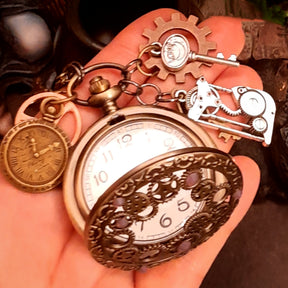 Magical pocket watch necklace adorned with Swarovski crystals and steampunk cog and gear charms