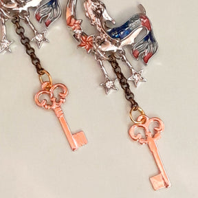 One of a kind Victorian style vintage style mermaid earrings with rose gold skeleton keys and crystal star charms
