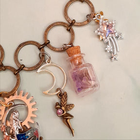 Corked glass bottles with amethyst chips and secret message scroll on handmade magical mermaid necklace chain - swarovski crystals