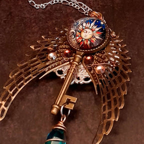 boho hippie sun and moon cabochon necklace glass icicle in pink yellow and green. angel wings swarovski crystals